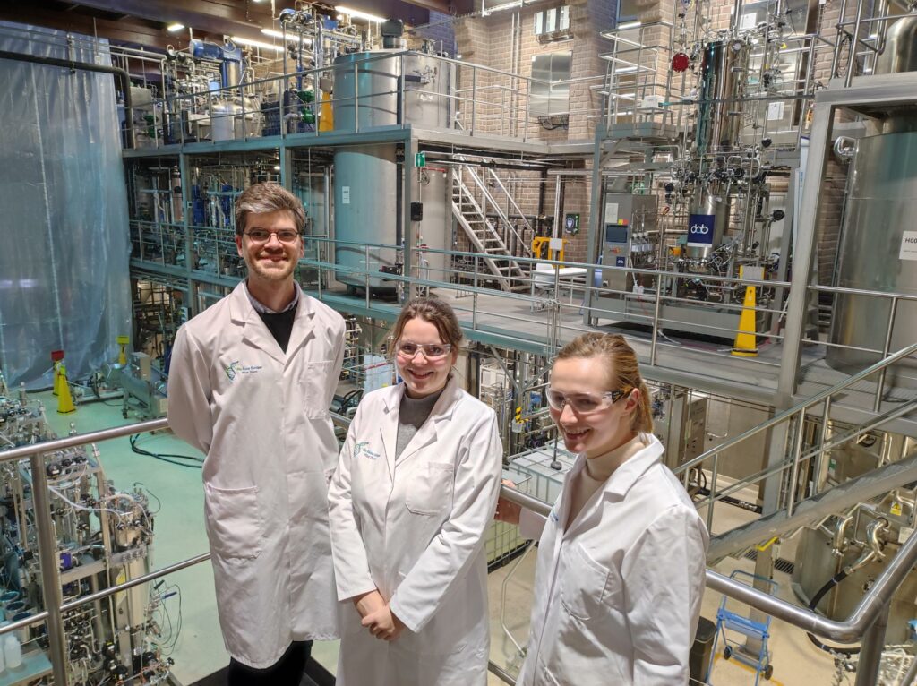 Alex, Pauline and Ellie from GFI Europe stood inside the Bio Base Europe pilot plant