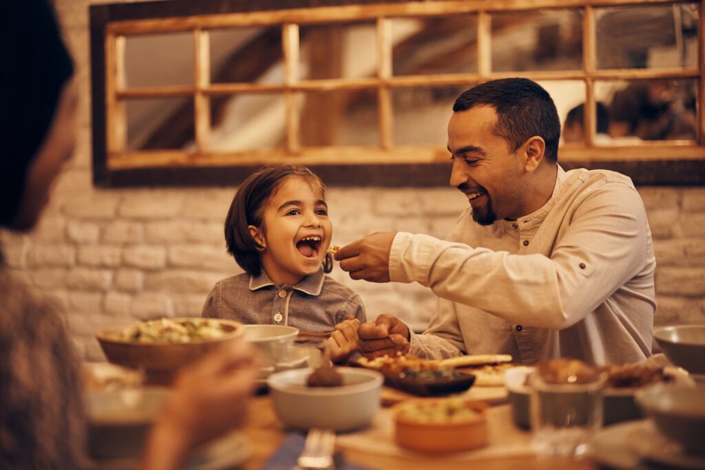 family eating together - a shift in our food systems is essential to tackling climate change