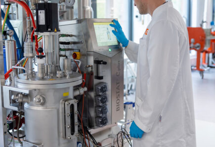 VTT Espoo facility, man working with fermentor to produce protein ingredients using biomass fermentation